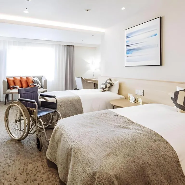 Bed in Miyazaki Kanko Hotel