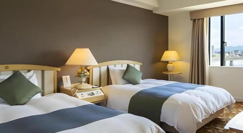 Bed in Miyazaki Kanko Hotel