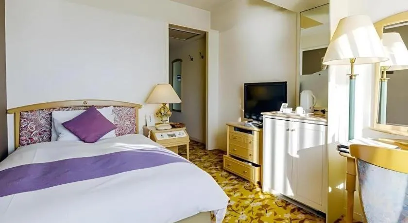 Bed in Miyazaki Kanko Hotel