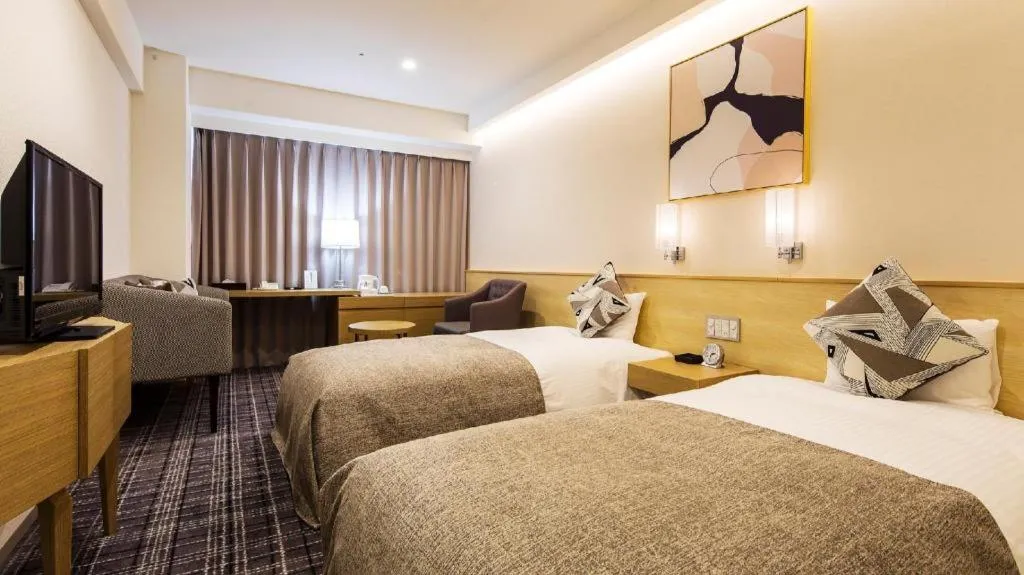 Bed in Miyazaki Kanko Hotel