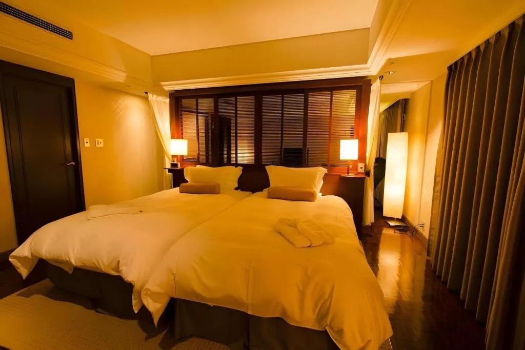 Bed in Miyazaki Kanko Hotel