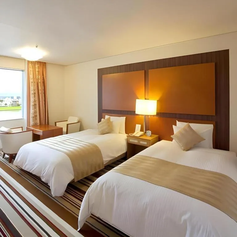 Bed in Miyazaki Kanko Hotel