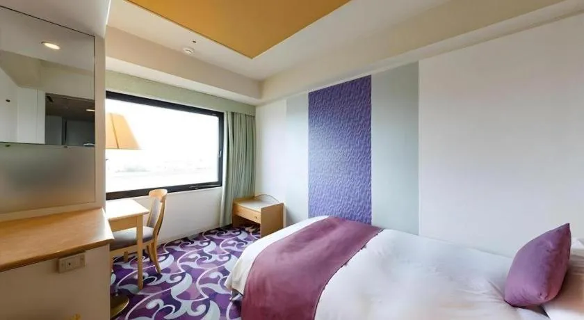 Bed in Miyazaki Kanko Hotel