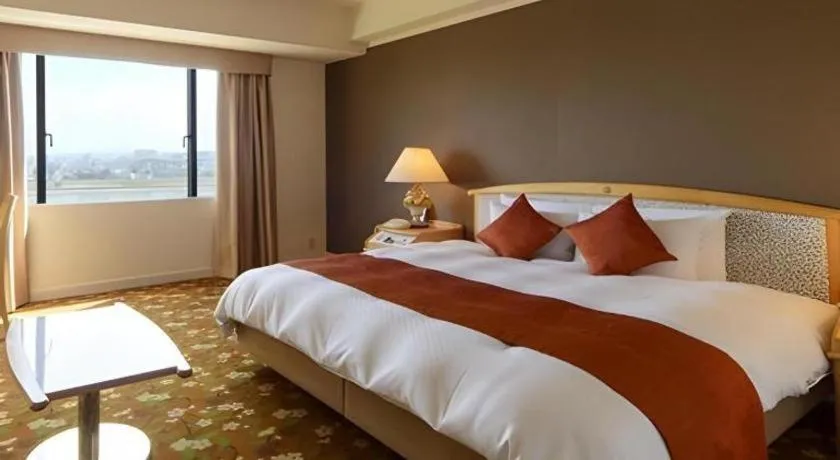 Bed in Miyazaki Kanko Hotel