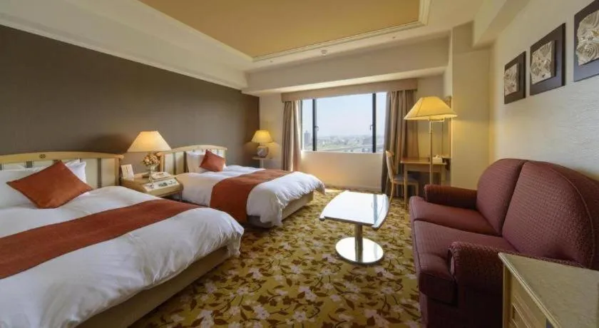 Bed in Miyazaki Kanko Hotel