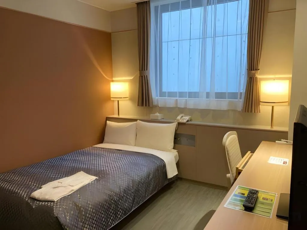 Bed in The Hamilton Sapporo Hotel