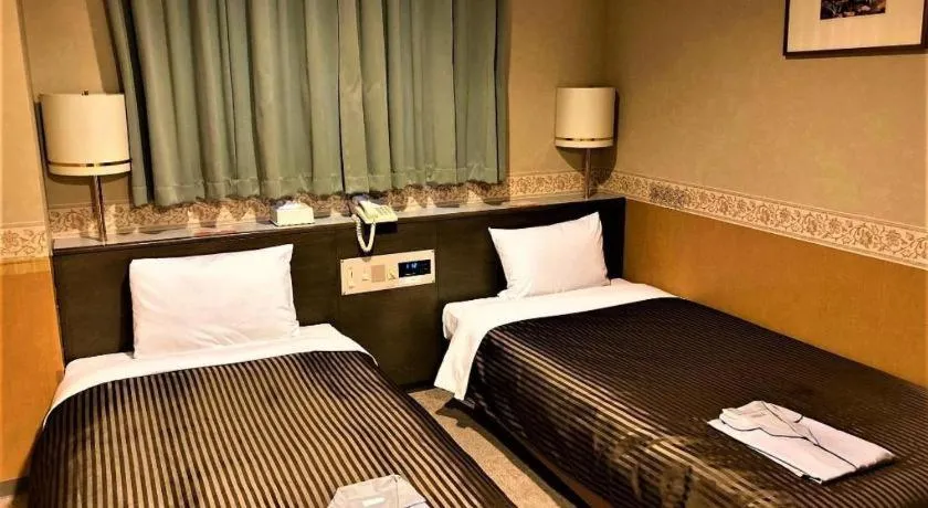 Bed in The Hamilton Sapporo Hotel