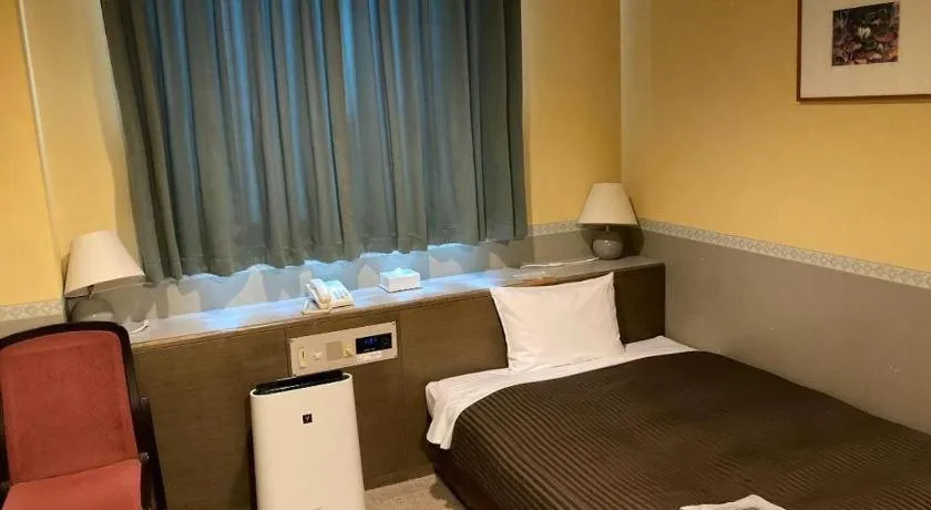 Bed in The Hamilton Sapporo Hotel