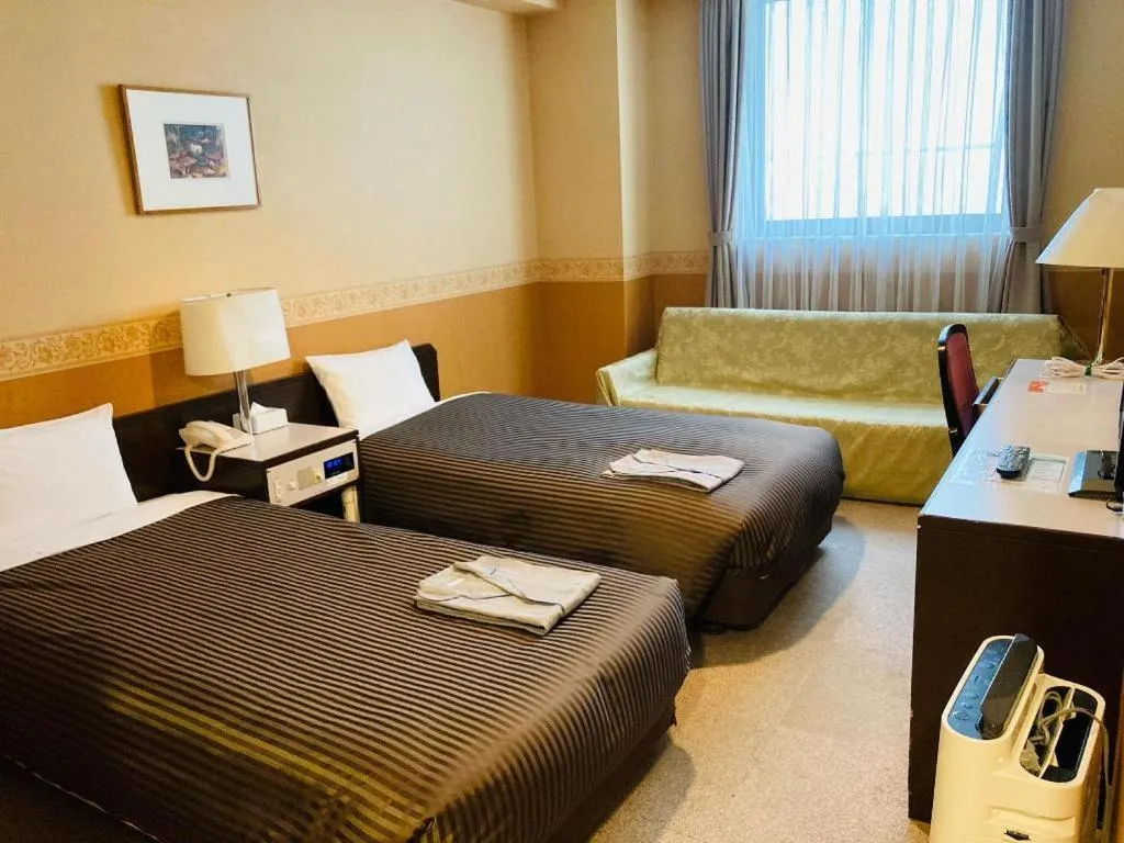 Bed in The Hamilton Sapporo Hotel