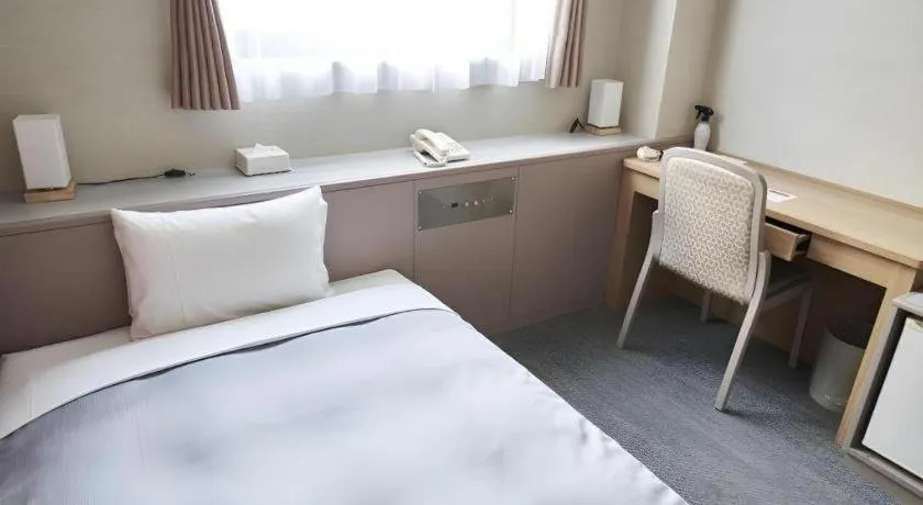 Bed in The Hamilton Sapporo Hotel