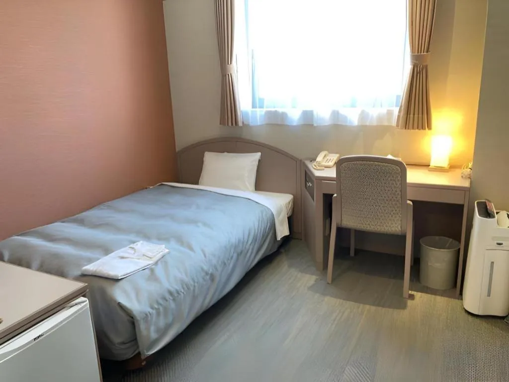 Bed in The Hamilton Sapporo Hotel