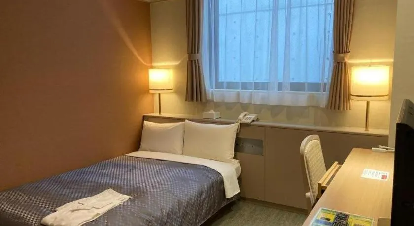 Bed in The Hamilton Sapporo Hotel