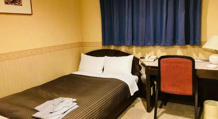 Bed in The Hamilton Sapporo Hotel