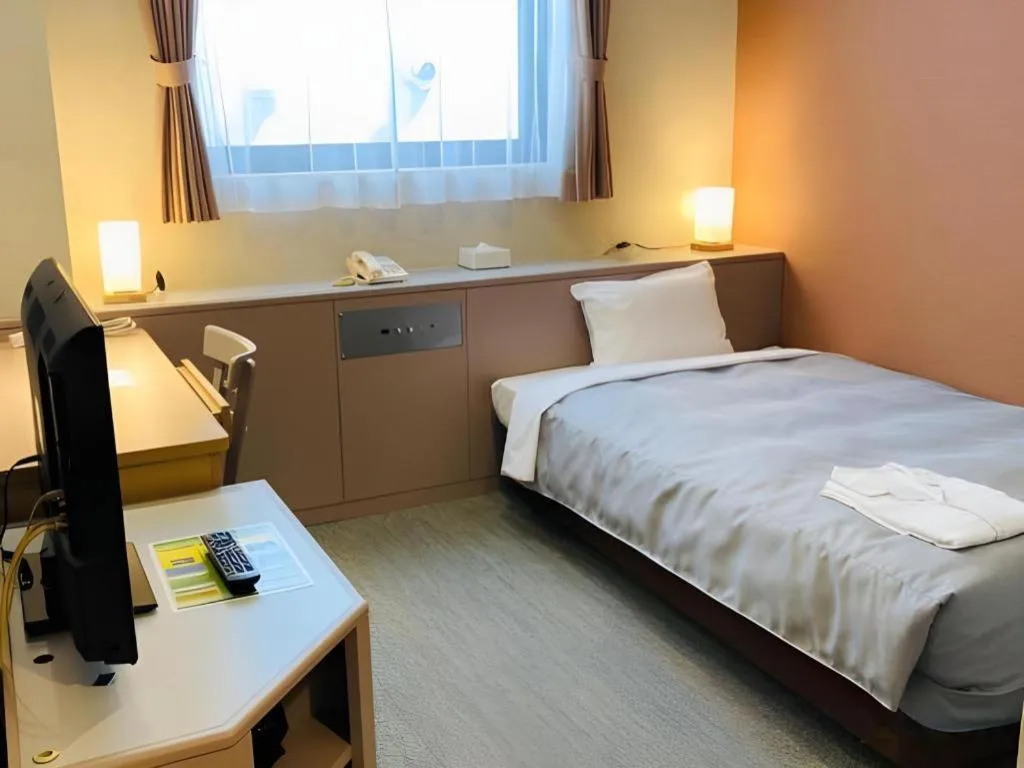 Bed in The Hamilton Sapporo Hotel