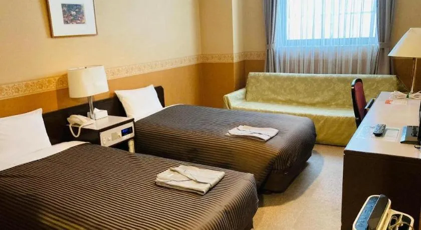 Bed in The Hamilton Sapporo Hotel