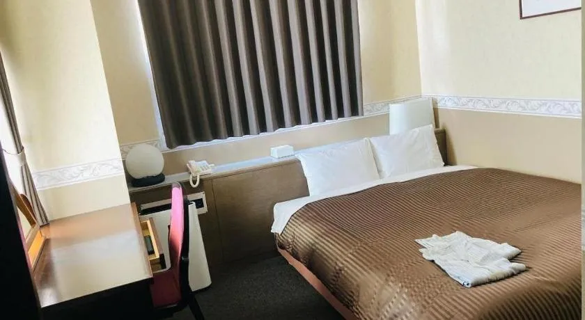 Bed in The Hamilton Sapporo Hotel