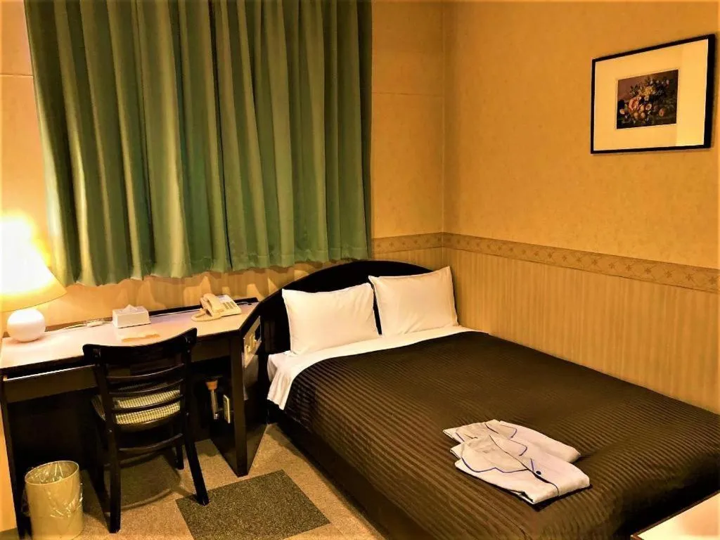 Bed in The Hamilton Sapporo Hotel