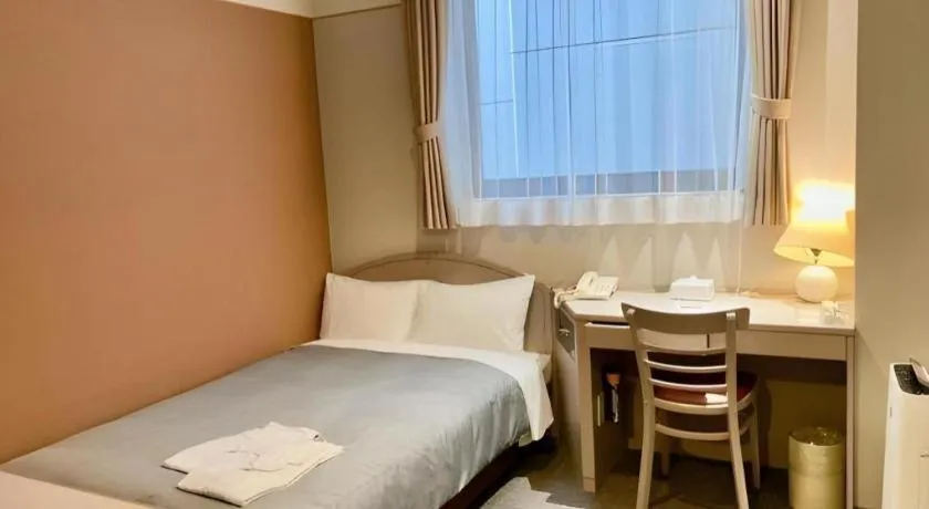 Bed in The Hamilton Sapporo Hotel