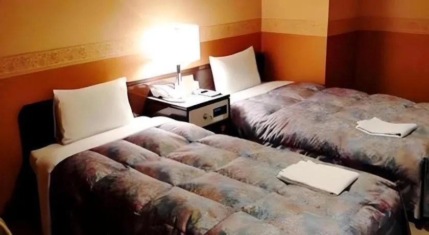 Bed in The Hamilton Sapporo Hotel