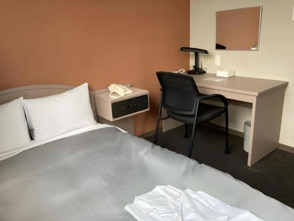 Bed in The Hamilton Sapporo Hotel