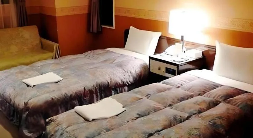 Bed in The Hamilton Sapporo Hotel