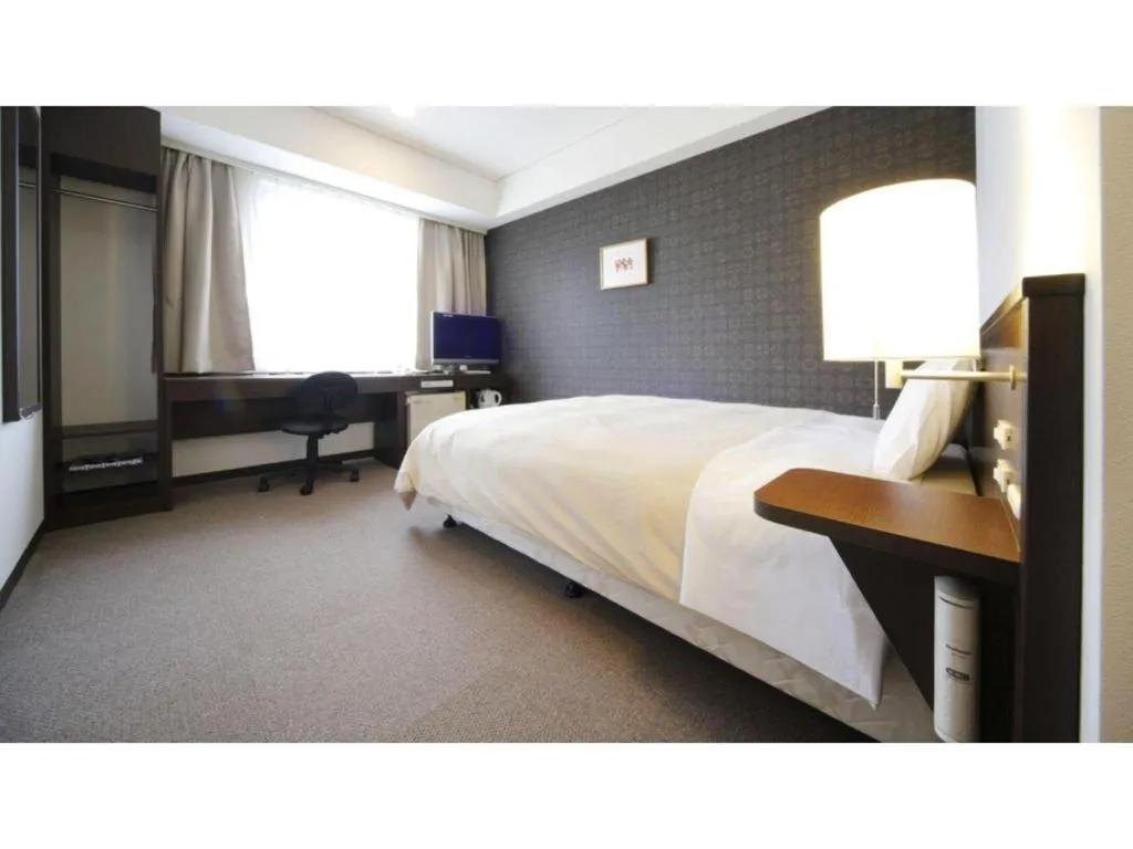 Bed in Hotel Park Side Hiroshima Peace Park