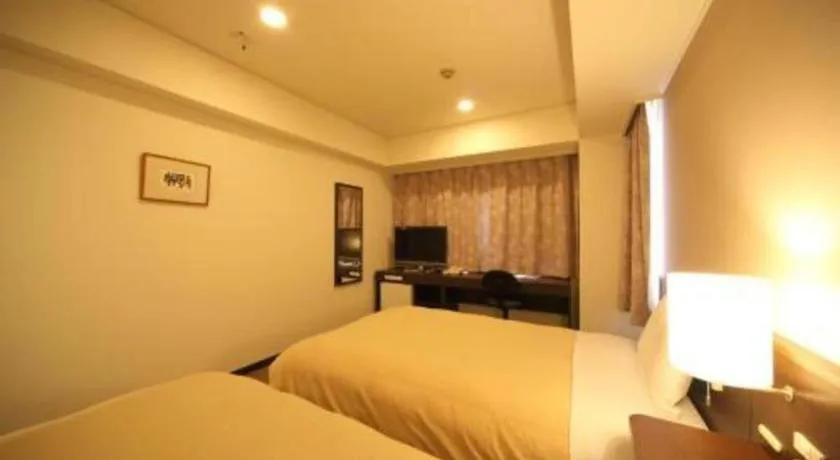 Bed in Hotel Park Side Hiroshima Peace Park