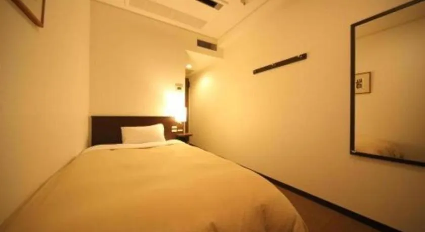 Bed in Hotel Park Side Hiroshima Peace Park