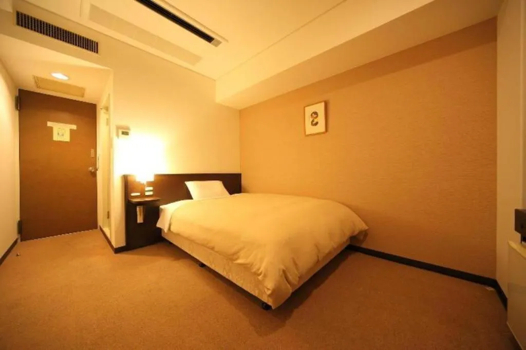 Bed in Hotel Park Side Hiroshima Peace Park