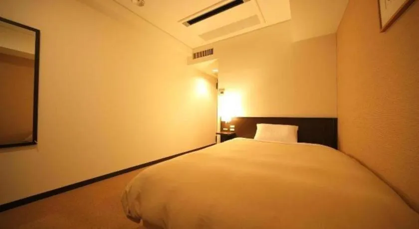 Bed in Hotel Park Side Hiroshima Peace Park