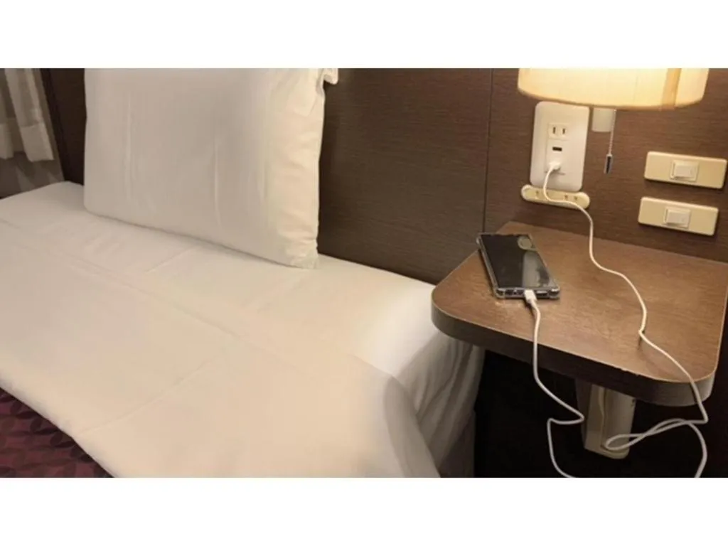 Bed in Hotel Park Side Hiroshima Peace Park