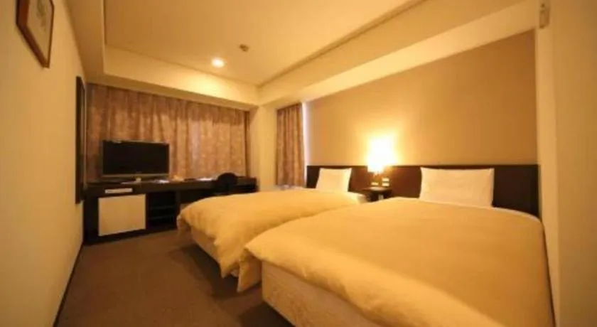 Bed in Hotel Park Side Hiroshima Peace Park