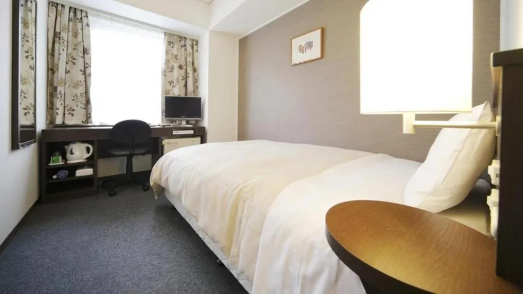 Bed in Hotel Park Side Hiroshima Peace Park