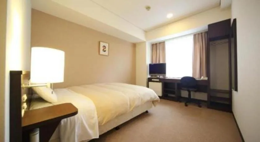 Bed in Hotel Park Side Hiroshima Peace Park