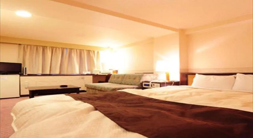 Bed in Hiroshima Kokusai Hotel