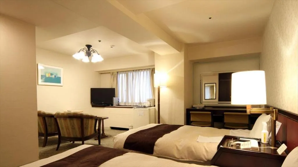 Bed in Hiroshima Kokusai Hotel