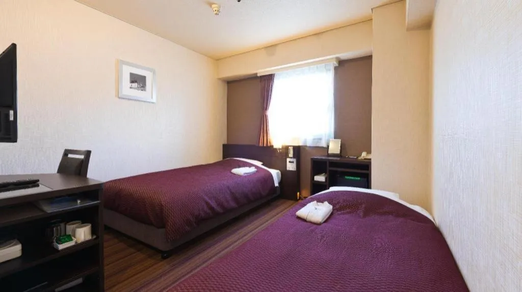 Bed in Daini Fuji Hotel