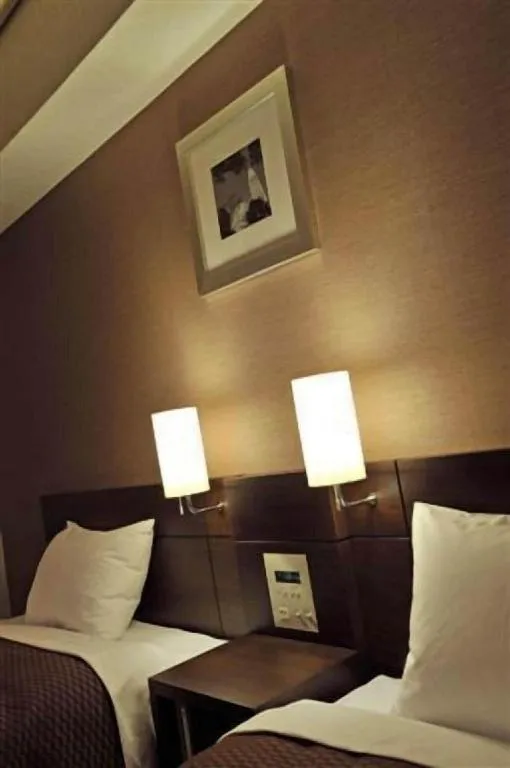 Bed in Daini Fuji Hotel