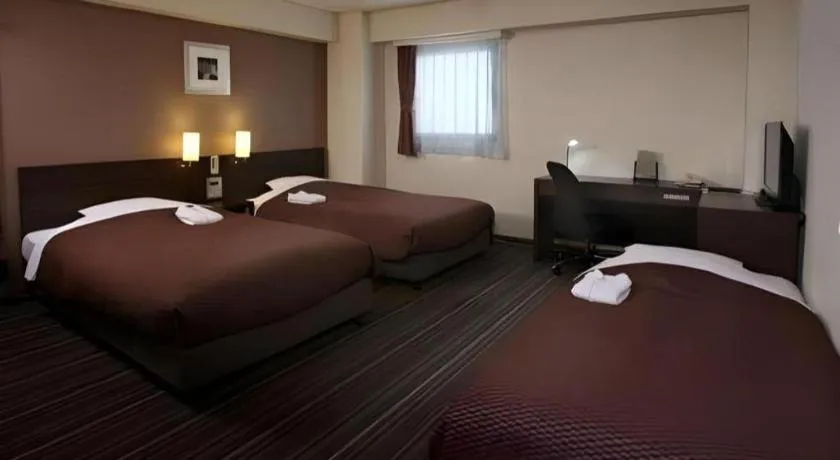 Bed in Daini Fuji Hotel