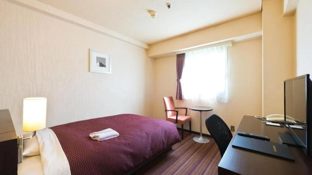 Bed in Daini Fuji Hotel