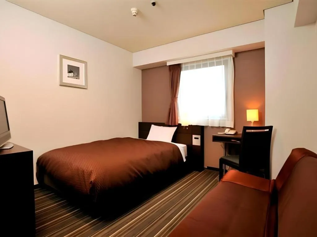 Bed in Daini Fuji Hotel