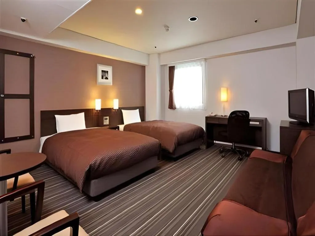 Bed in Daini Fuji Hotel