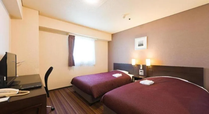 Bed in Daini Fuji Hotel