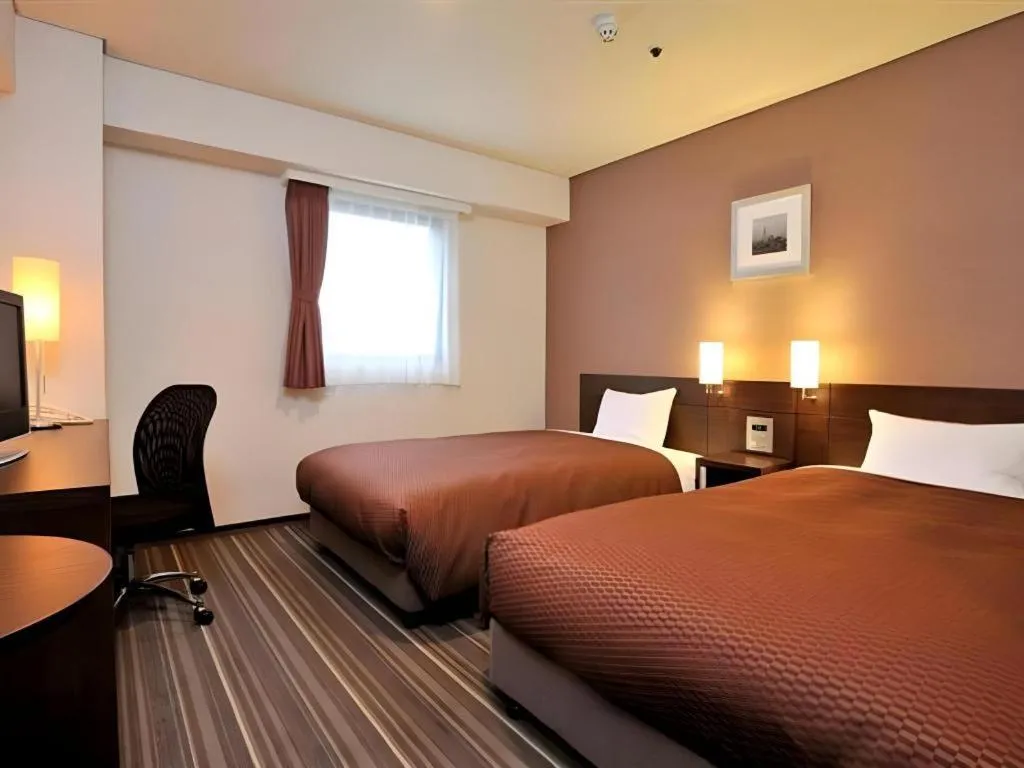 Bed in Daini Fuji Hotel