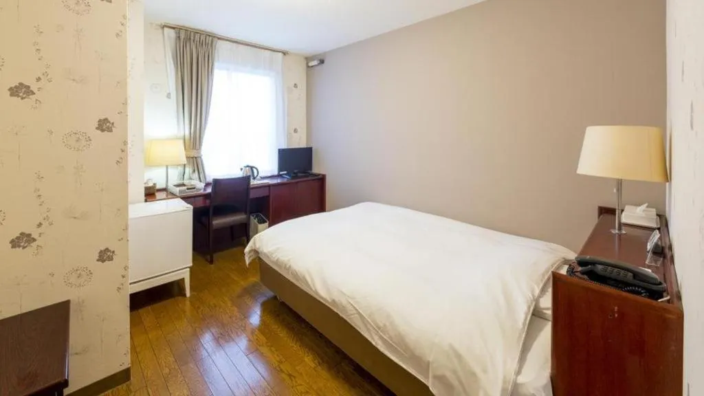 Bed in Fukuyama Terminal Hotel