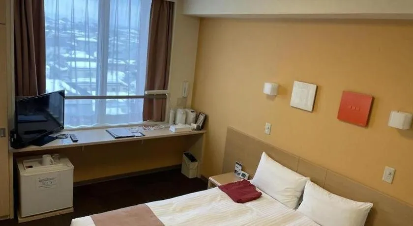 Bed in Quad Inn Yokote