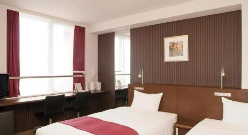 Bed in Quad Inn Yokote