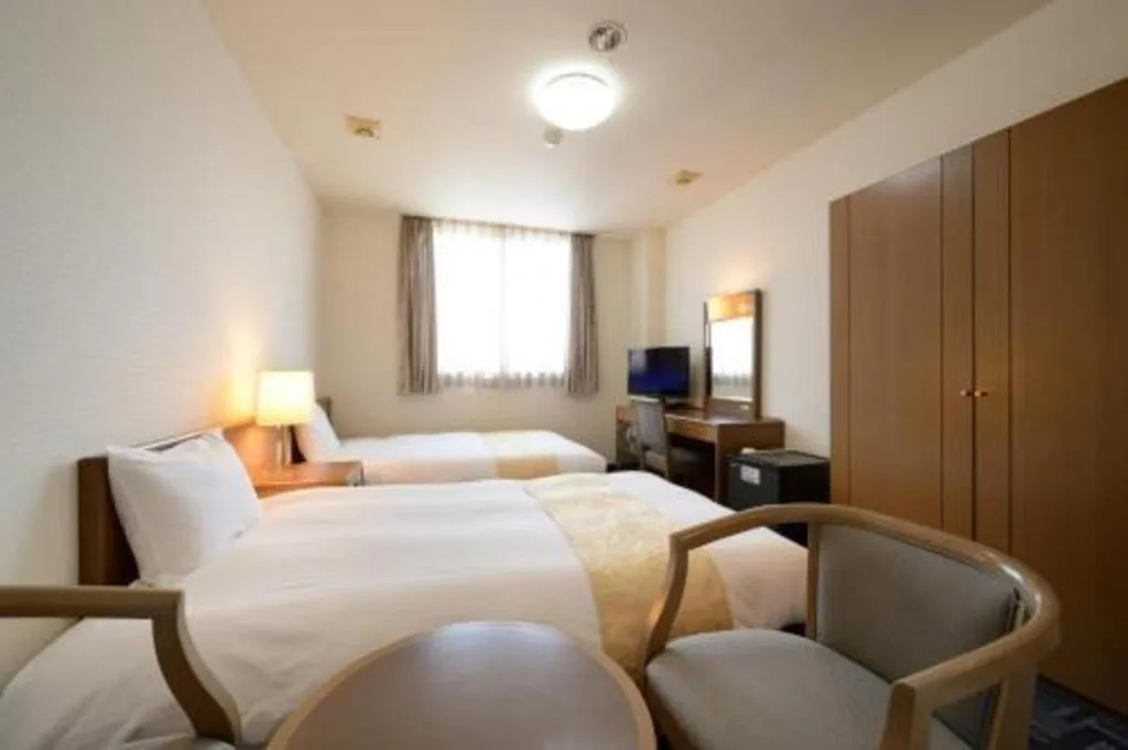 Bed in Hotel New Palace Aizuwakamatsu