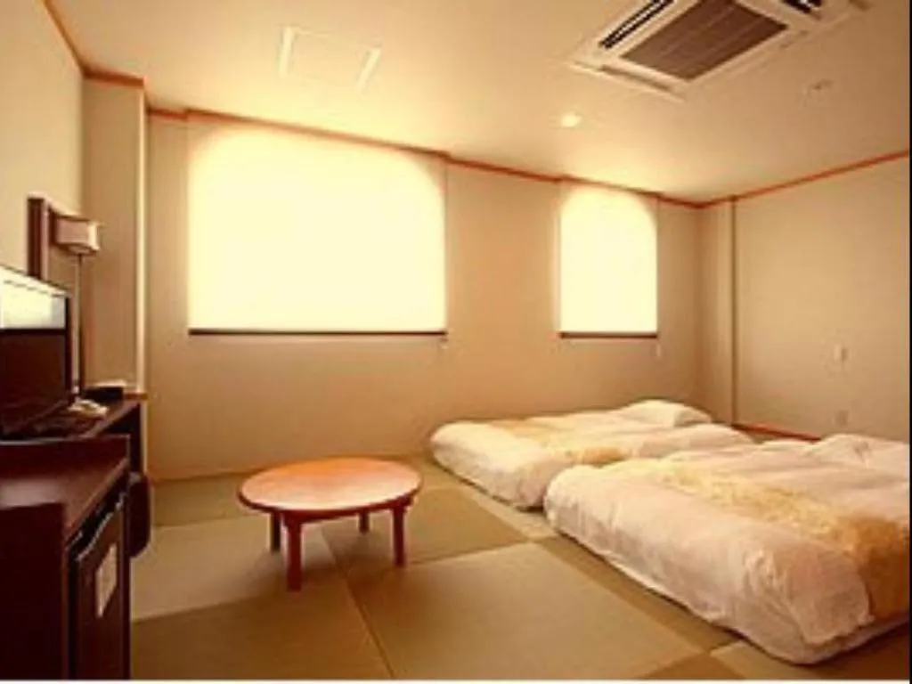 Bed in Hotel New Palace Aizuwakamatsu