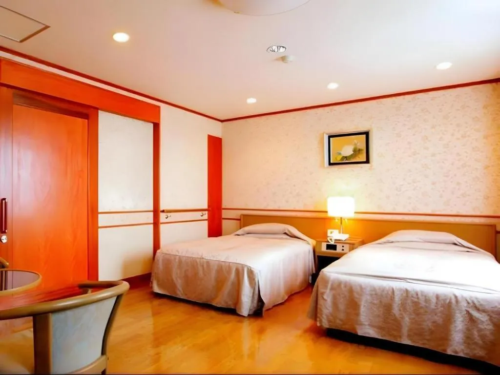 Bed in Hotel New Palace Aizuwakamatsu